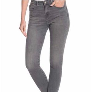 Mid rise grey skinny jeans